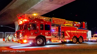 South San Francisco Fire Department CA fire truck Spartan Gladiator Classic SpartanERV aerial ladder quint fire truck at night fire truck at crash site Larry Shapiro photographer #larryshapiro shapirophotography.net Truck 62